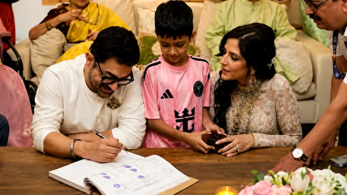 aamir-khan-gauri-spratt-marriage-controversy Aamir Khan and Gauri Spratt after their civil marriage, which has sparked public discussion over an interfaith union.
